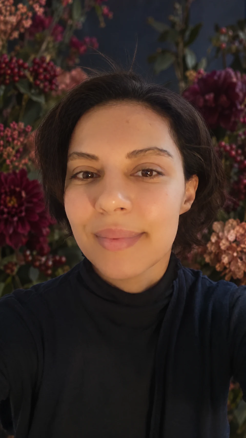 Aaliah Lait, with a digitally edited floral background.
